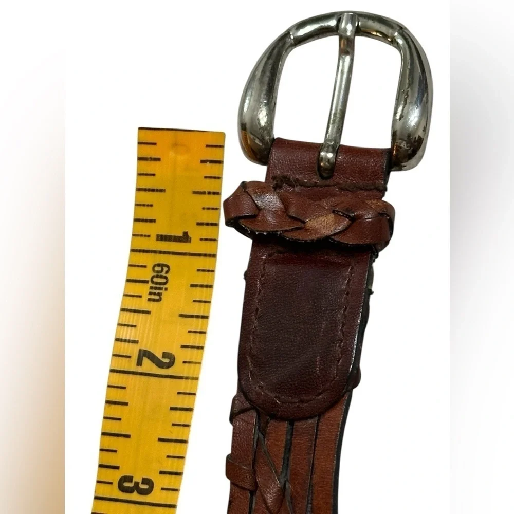 A men’s / women’s leather braided belt, Made in Uraguay. M.